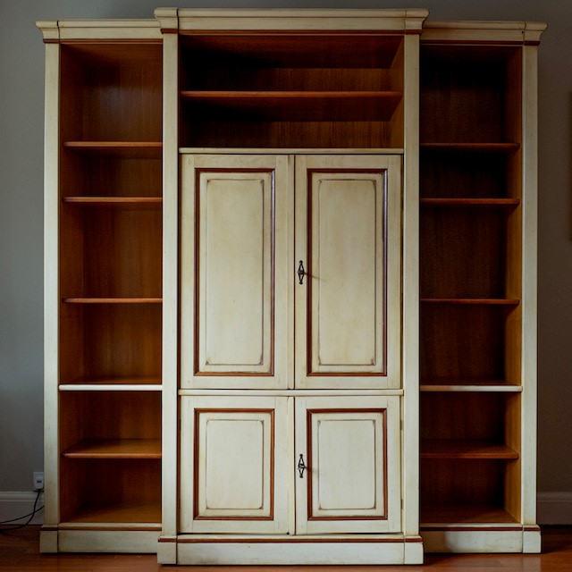 A reproduction Continental painted breakfront bookcase / media cabinet, width 204cm, depth 55cm, height 222cm